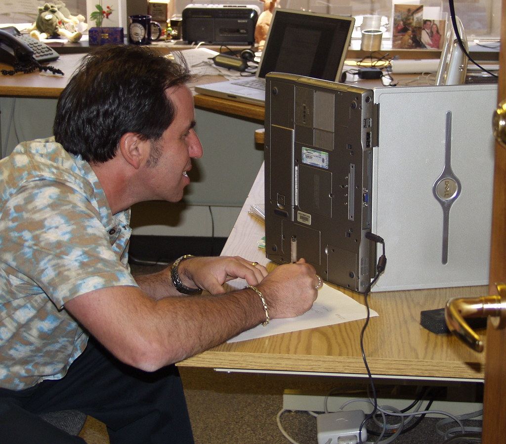 Analyst working through operational data at a desk